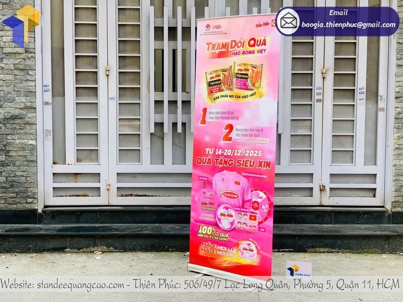 Đặt mua standee banner kéo cuốn nhôm quảng cáo rẻ in ấn cho sự kiện triễn lãm